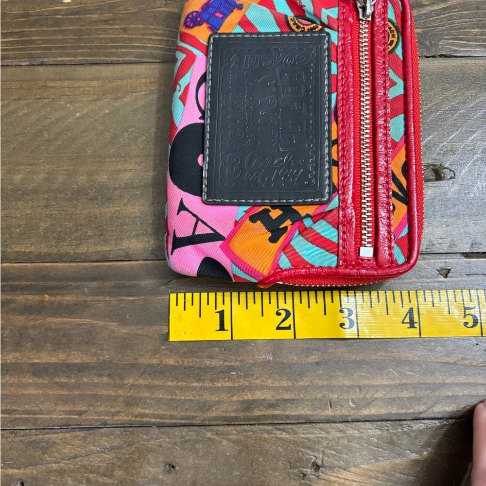 Coach Poppy Graffiti Wristlet